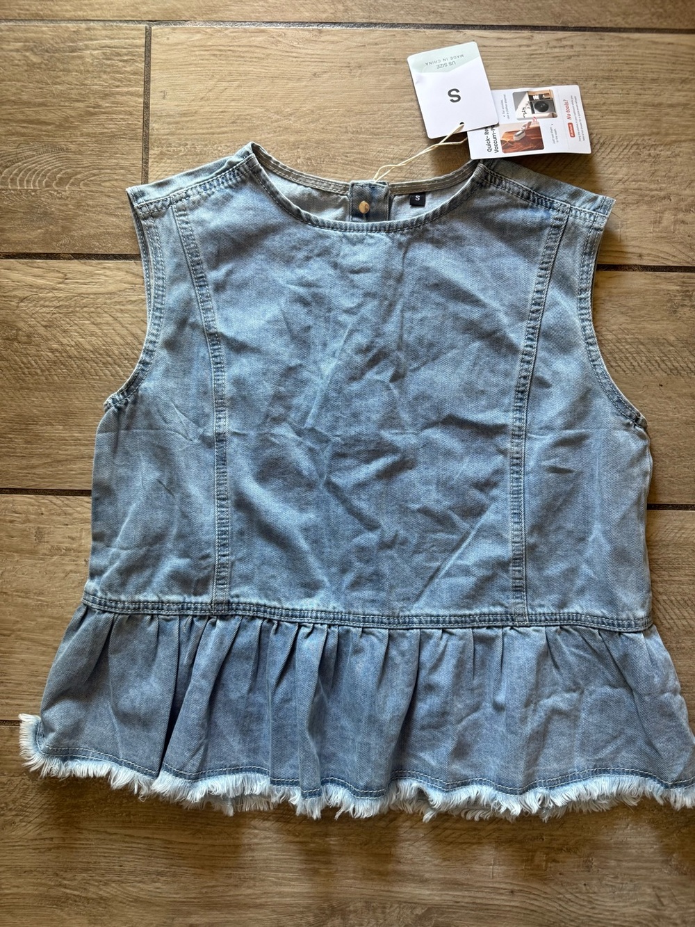 Sleeveless Light Wash Denim Peplum Top - Light Blue
